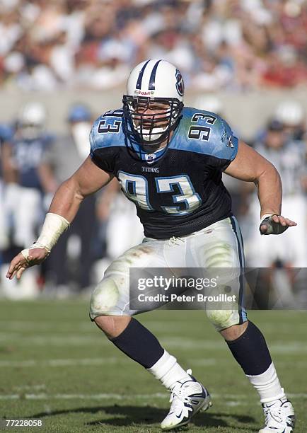 Kyle Vanden Bosch defensive end for the Tennessee Titans guards against the run in a game against the Arizona Cardinals at Sun Devil Stadium in...