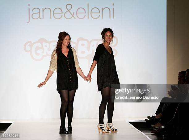 Designers Jane Arifien and Eleni Arifien of the label jane&eleni greet the audience following their catwalk collection show as part of the New...
