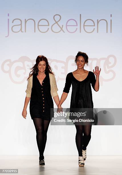 Designers Jane Arifien and Eleni Arifien of the label jane&eleni greet the audience following their catwalk collection show as part of the New...