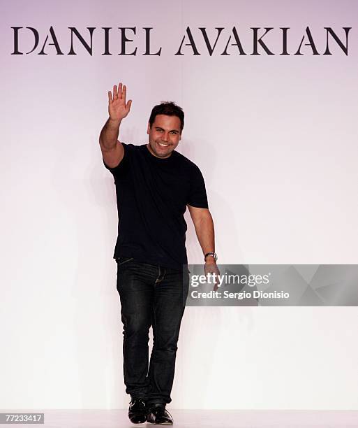 Designer Daniel Avakian of the label Daniel Avakian acknowledges the audience following his catwalk collection show as part of the New Generation...