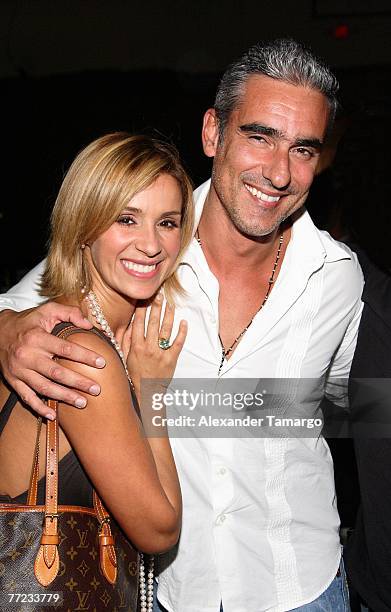 Catherine Siachoque and husband Miguel Varoni pose during the viewing party for the premiere episode of Telemundo's soap opera "Pecados Ajenos" on...