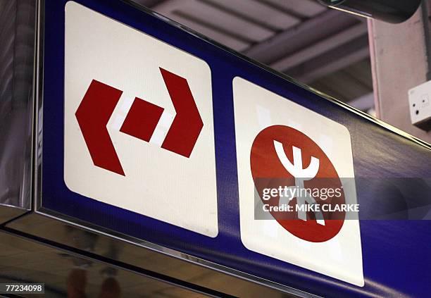 Logos of the Kowloon-Canton Railway and Mass Transit Railways are seen in Hong Kong, 09 October 2007. Shares of Hong Kong's largest railway operator...