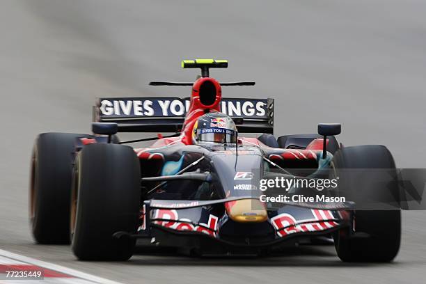 Sebastian Vettel of Germany and Scuderia Toro Rosso drives during the Chinese Formula One Grand Prix at the Shanghai International Circuit on October...