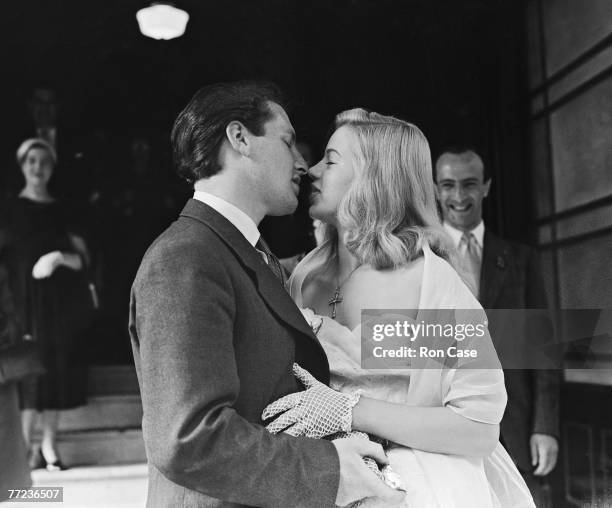 British actress Diana Dors with her first husband Dennis Hamilton after their wedding at Caxton Hall, Westminster, London, 3rd July 1951.