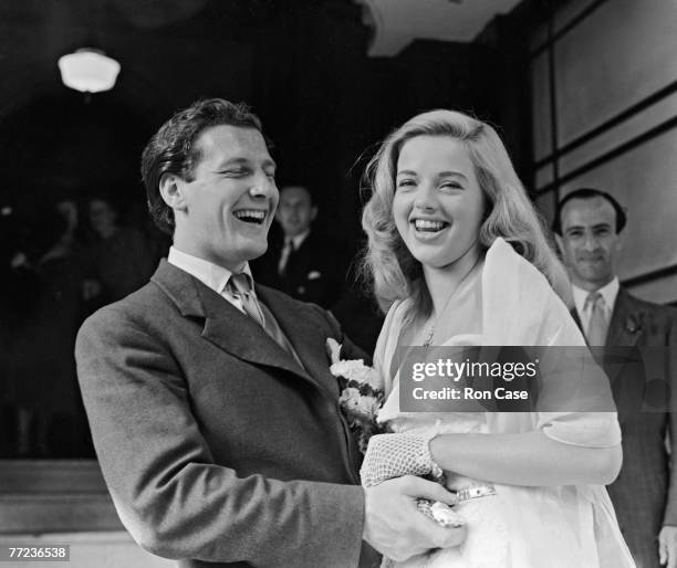 British actress Diana Dors with her husband Dennis Hamilton after their wedding at Caxton Hall, Westminster, London, 3rd July 1951.