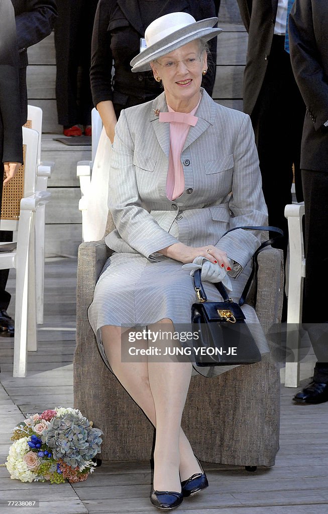 Denmark's Queen Margrethe II sits as she