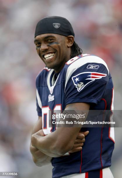 Randy Moss of the New England Patriots laughs against the Cleveland Browns at Gillette Stadium on October 7, 2007 in Foxborough, Massachusetts. The...