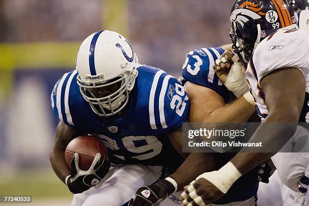 Joseph Addai of the Indianapolis Colts rushes against the Denver Broncos during the NFL game on September 30, 2007 at the RCA Dome in Indianapolis,...