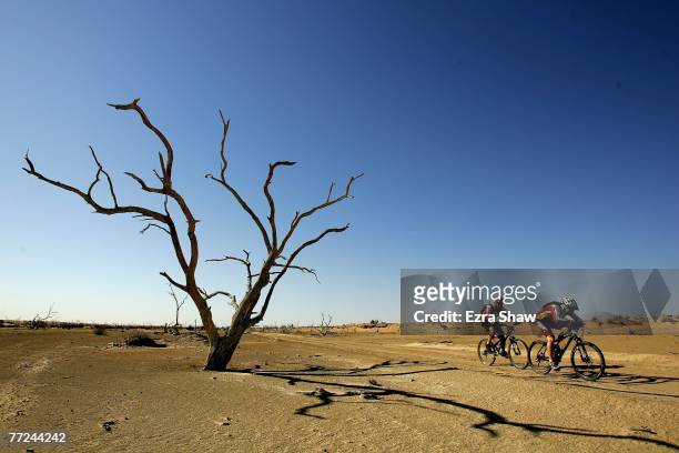 Mathew Dickerson from Dubbo, New South Wales and Tim Sullivan of Cottersloe, Western Australi, ride through the petrified forest during day three of...