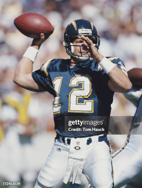 Erik Kramer, Quarterback for the San Diego Chargers prepares to throw a pass during the American Football Conference West game against the Seattle...