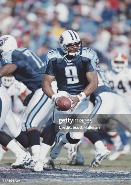 Steve McNair, Quarterback for the Tennessee Titans runs the ball during the American Football Conference Central game against the Cleveland Browns on...