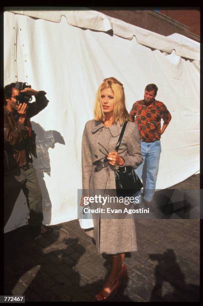 Model Laura Bailey stands at the "Kids for Kids" benefit carnival October 1, 1995 in New York City. The carnival, which was funded by Harper's Bazaar...