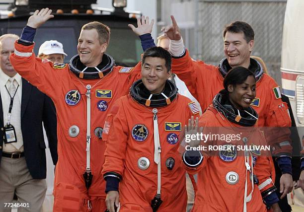 Italian astronaut Paolo Nespoli and his crewmates of STS-120 the space shuttle Discovery Scott Parazynski, Daniel Tani and Stephanie Wilson board the...