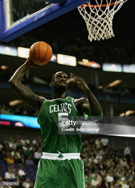 Kevin Garnett of Boston dunks the ball during NBA Europe Live 2007 Tour match between the Boston Celtics and the Minnesota Timberwolves at the O2...