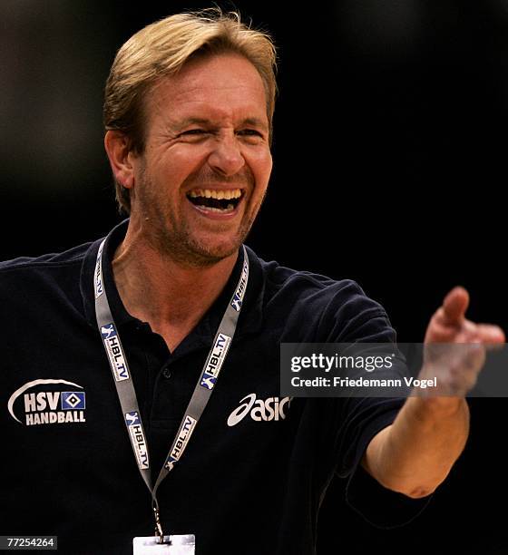 Coach Martin Schwalb of Hamburg laughs during the Bundesliga Handball match between HSV Hamburg and VfL Gummersbach at the Colorline Arena on October...