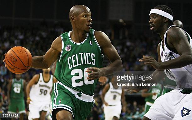Ray Allen of Boston is challenged by Ricky Davis of Minnesota during NBA Europe Live 2007 Tour match between the Boston Celtics and the Minnesota...