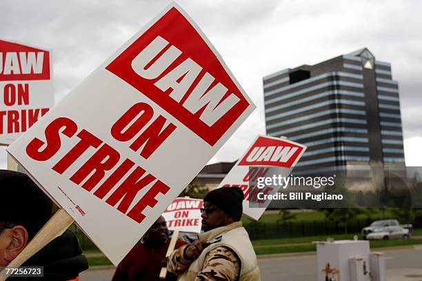 United Auto Workers members walk off the job and picket at the Chrysler LLC world headquarters after the UAW and Chrysler LLC failed to reach a...