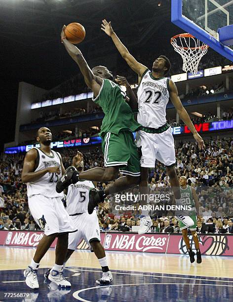 Kevin Garnett of The Boston Celtics drives to the hoop as the Minnesota Timberwolves' Corey Brewer tries to block during their NBA Europe Live 2007...