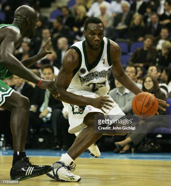 Al Jefferson of Minnesota is challenged by Kevin Garnett of Boston during NBA Europe Live 2007 Tour match between the Boston Celtics and the...