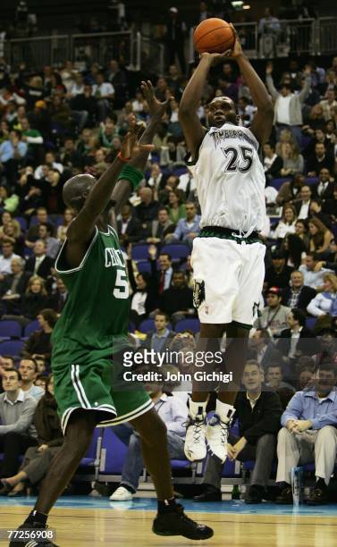 Al Jefferson of Minnesota shoots past Kevin Garnett of Boston during NBA Europe Live 2007 Tour match between the Boston Celtics and the Minnesota...
