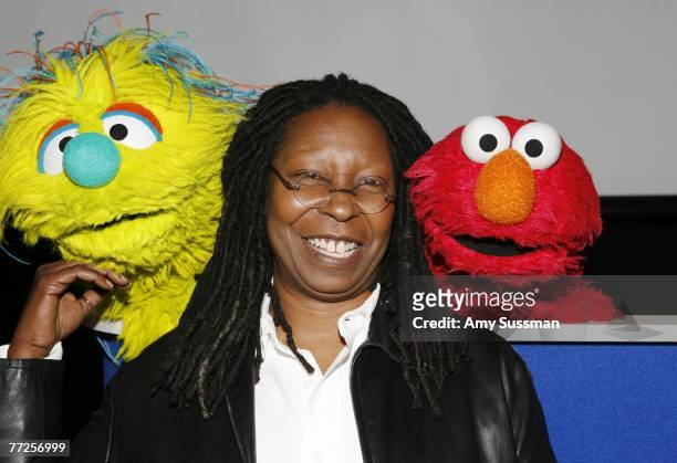 New Sesame Street character Azibo, comedian and UN Goodwill Ambassador Whoopi Goldberg and Sesame Street's Elmo attend a press conference to announce...