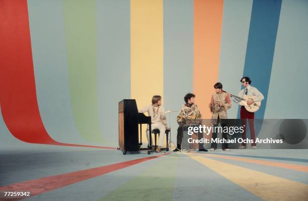 Davy Jones, Mickey Dolenz, Peter Tork and Mike Nesmith on the set of the television show The Monkees in August 1967 in Los Angeles, California.