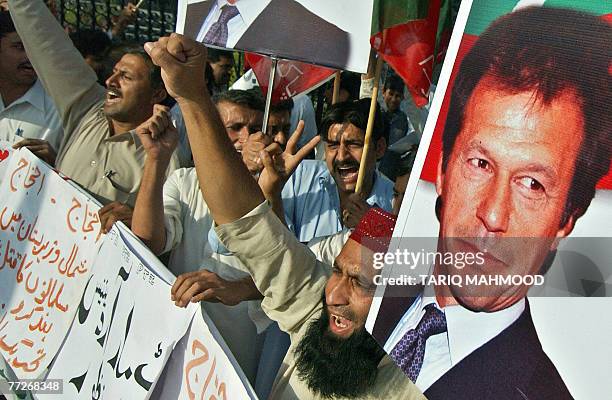 Activists of Pakistan Tehreek-e-Insaf stage a protest against the military operation in the tribal area of North Waziristan, 11 October 2007....