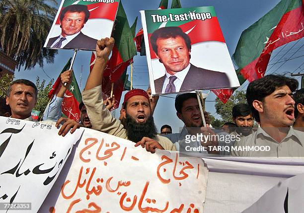 Activists of Pakistan Tehreek-e-Insaf party stage a protest against the military operation in the tribal area of North Waziristan, in Peshawar, 11...