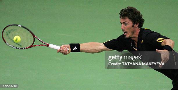 Russian Marat Safin returns a ball to his compatriot Igor Andreev at the Kremlin Cup international men's tennis tournament in Moscow, 11 October...