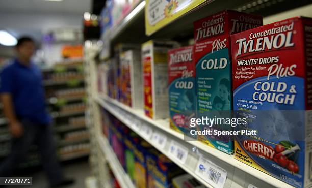 Johnson & Johnson, infants nonprescription cough and cold products are displayed on a shelf October 11, 2007 at a pharmacy in Brooklyn, New York. The...