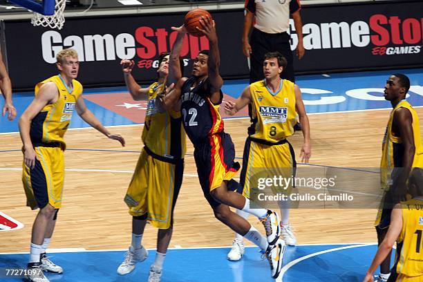 Stromile Swift of the Memphis Grizzlies shoots during a game against the Estudiante Madrid game during the EA Sports NBA Europe Live Tour at Palacio...