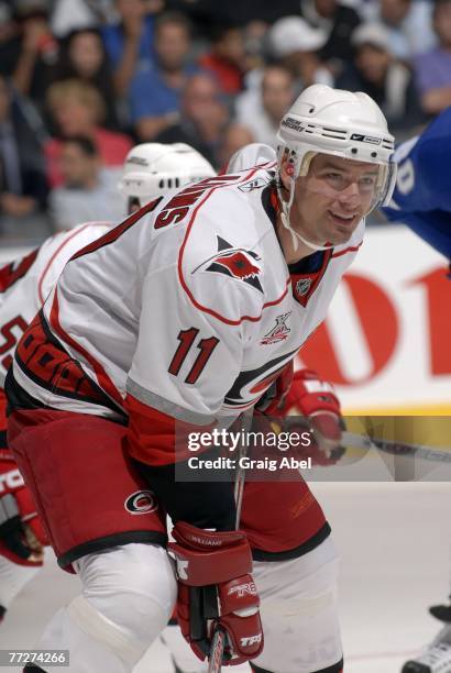 Justin Williams of the Carolina Hurricanes smiles against the Toronto Maple Leafs on October 9, 2007 at the Air Canada Centre in Toronto, Ontario,...