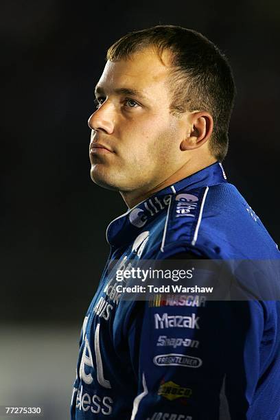 Ryan Newman, driver of the Alltel Dodge, stands on the grid during qualifying for the NASCAR Nextel Cup Series Bank of America 500 at Lowe's Motor...