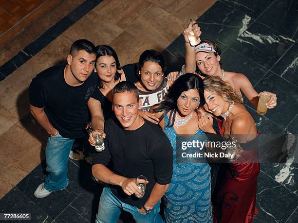 large group of young people posing at party - chink eye stock pictures, royalty-free photos & images