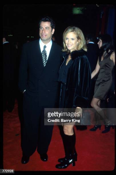 Actor John Travolta and his wife Kelly Preston attend the premiere of the film "Get Shorty" October 12, 1995 in Los Angeles, CA. The film's star,...