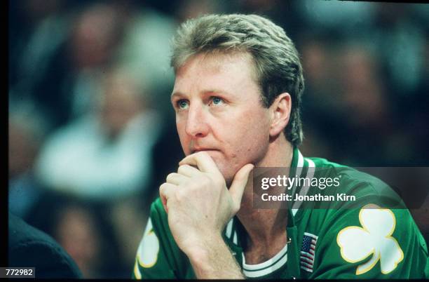 Basketball player Larry Bird sits during a basketball game February 15, 1991 in Chicago, IL. Bird played for the Boston Celtics, helped them to win...