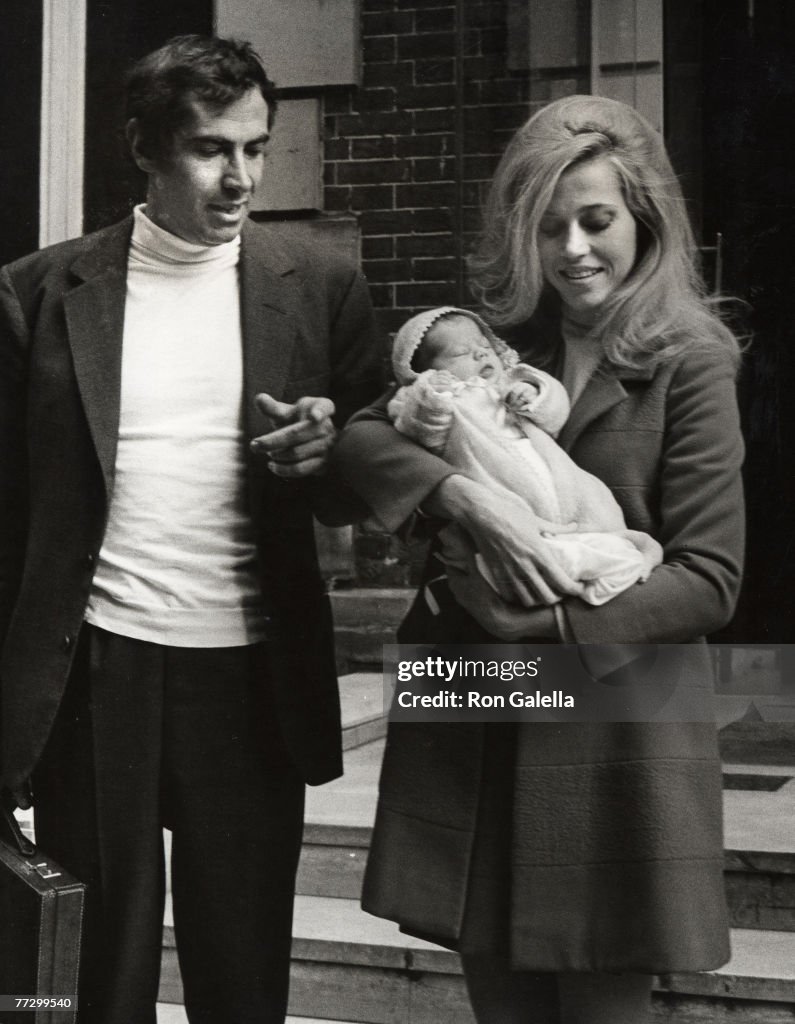 Jane Fonda and Roger Vadim Depart from the Belvedere Hospital in Paris with Their New Baby Vanessa - October 7, 1968