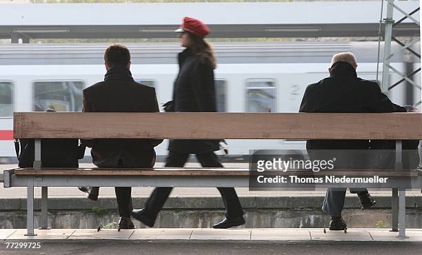 Passengers wait for a train at Hauptbahnhof train station during a nation-wide strike of the German locomotive drivers union, the GDL, of local and...