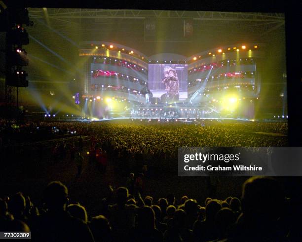 Mick Jagger appears on a giant screen during a concert by the Rolling Stones at the Millennium Stadium , Cardiff, Wales, 29th August 2006.