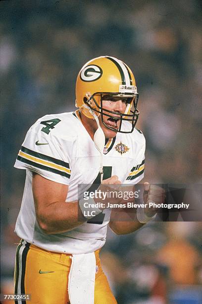 Quarterback Brett Favre of the Green Bay Packers celebrates against the Denver Broncos in Super Bowl XXXlI on January 25, 1998 in Qualcomm Stadium in...