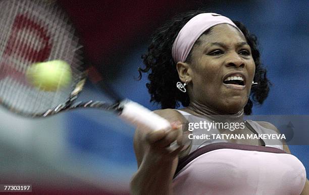 Serena Williams of the United States returns the ball to Nicole Vaidisova of Czech Republic during the WTA Kremlin Cup tennis tournament in Moscow,...