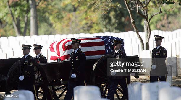 Soldiers from the US 3rd Infantry, traditionally known as the Old Guard, escort the remains of 12 US army soldiers, killed when their UH-60 Black...