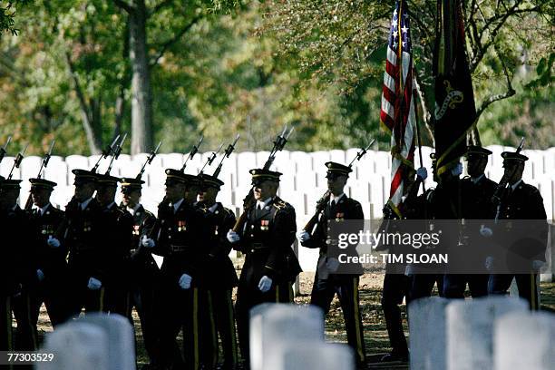 Soldiers from the US 3rd Infantry, traditionally known as the Old Guard, participate in the funeral service for the remains of 12 US army soldiers,...