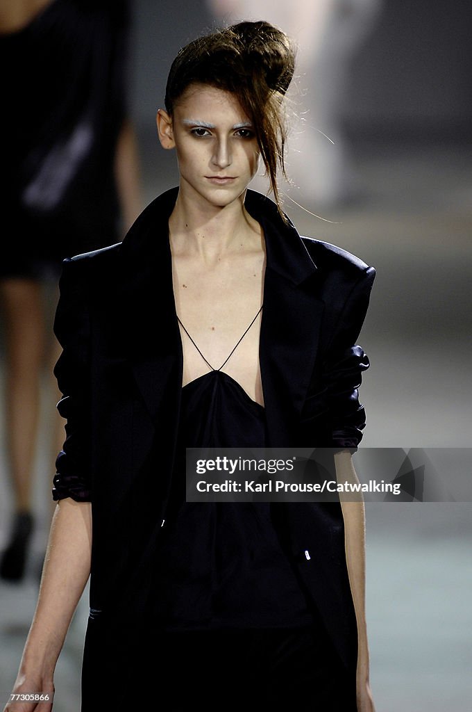 A model walks the catwalk at the Haider Ackermann collection show ...