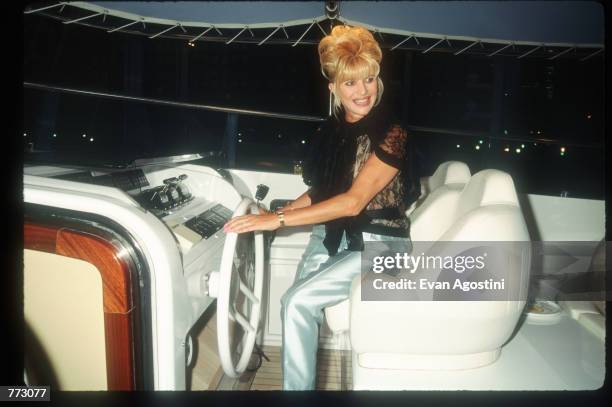 Ivana Trump holds the steering wheel in her $7 million yacht named "M.Y. Ivana" September 11, 1996 in New York City. Trump held an exclusive party...