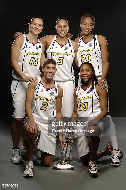 Penny Taylor, Diana Taurasi, Tangela Smith, Kelly Miller and Cappie Pondexter of the Phoenix Mercury 2007 WNBA Champions pose for a portrait with...
