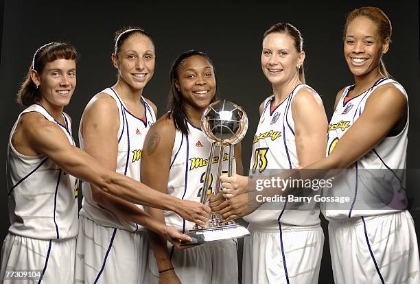 Kelly Miller, Diana Taurasi, Cappie Pondexter, Penny Taylor, and Tangela Smith of the Phoenix Mercury 2007 WNBA Champions pose for a portrait with...