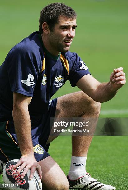 Cameron Smith checks the wind direction before kicking during the Australian Kangaroos captain's run at Westpac Stadium on October 13, 2007 in...