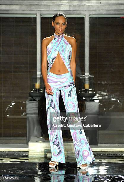 Model walks the runway at the FISICO by Christina Ferrari show at the Setai on October 12, 2007 in Miami Beach, Florida.