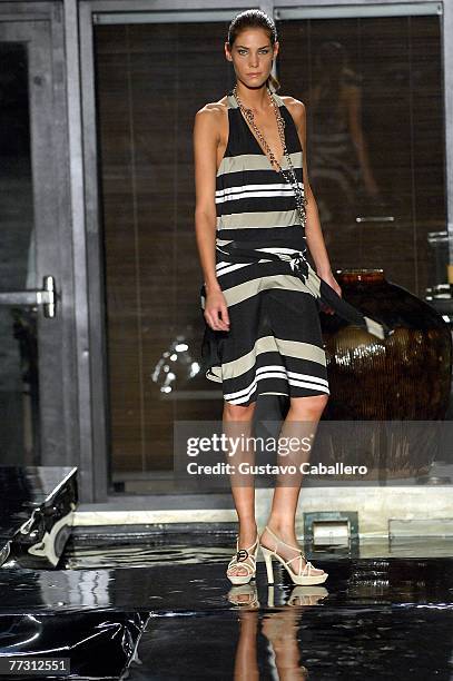 Model walks the runway at the FISICO by Christina Ferrari show at the Setai on October 12, 2007 in Miami Beach, Florida.